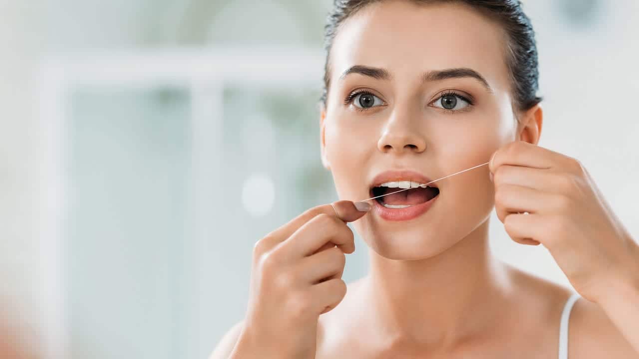 The Link Between Poor Flossing and Gum Disease Royal Leamington Spa